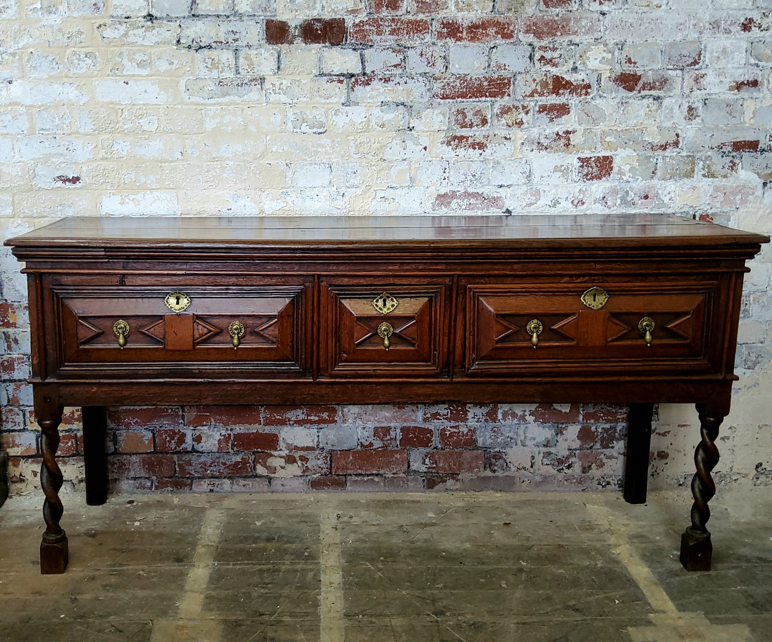 A Charles II Oak Dresser Base