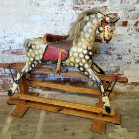 A Mid 20Th Century Carved Dapple Grey Rocking Horse