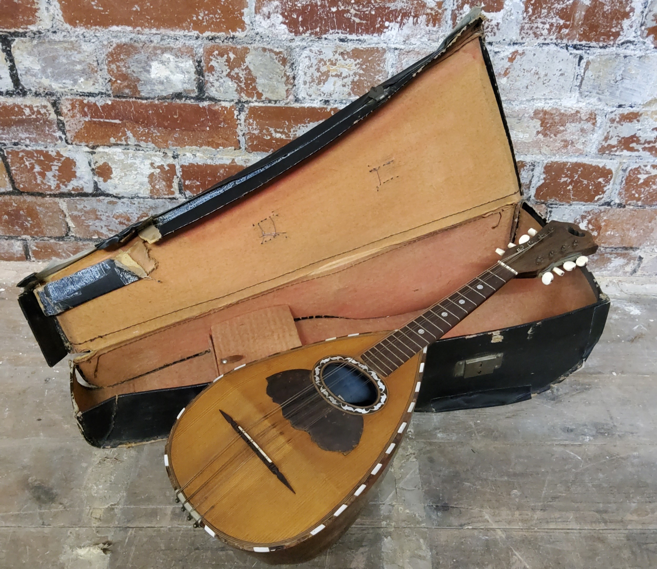 A 19Th Century Italian Mandolin Inlaid With Mother Of Pearl And Tortoise Shell
